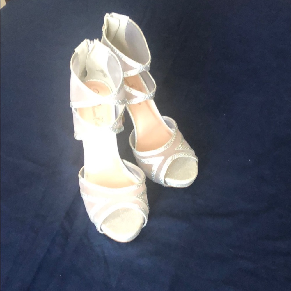 Silver w/ glitter 4” heels and .5” platform size 8